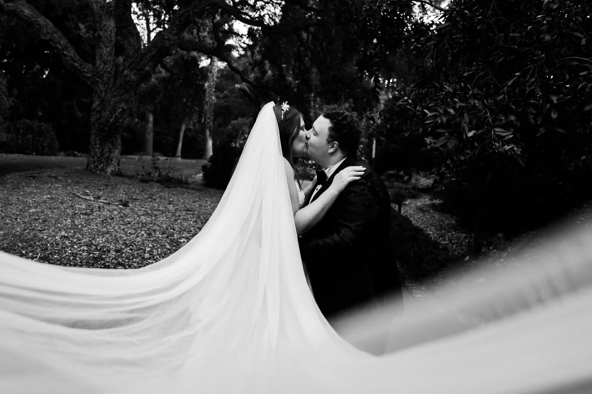 Russell and Holly beneath a trailing veil at Truffleduck